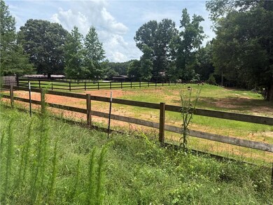 View of yard with a rural view
