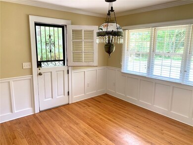 Formal dining with original light fixture