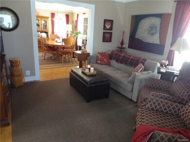 Large and inviting living room with wood parquet f