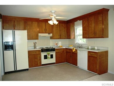Eat in kitchen with new vinyl floor, Ceiling fan w