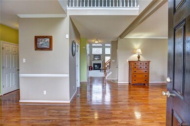 Grand entrance onto beautiful hardwood flooring re