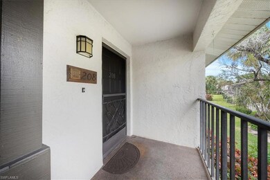 Doorway to property featuring a balcony