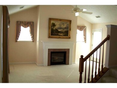 Living Room. CATHEDRAL CEILING WITH A PADDLE FAN, 
