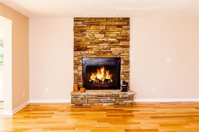 Cozy up to the Stacked Stone Fireplace on cool eve
