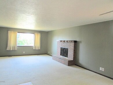 Upstairs Living Area and Fireplace