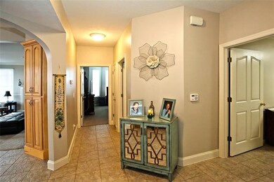 Hall way; ceramic tile flooring; neutral colors; K