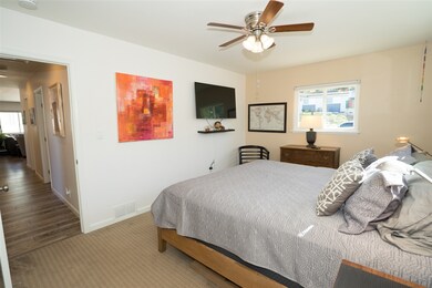 Features a floor to ceiling, tiled, walk in shower