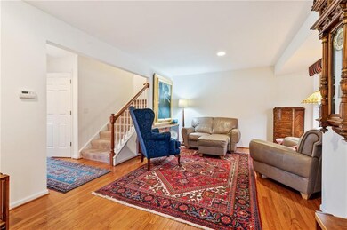 The first floor showcases gleaming hardwood floori