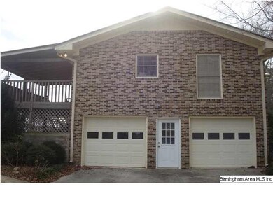 2 car garage on basement level.  Covered porch off