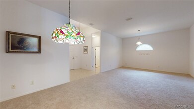 Dining Room (foreground), living room (background)