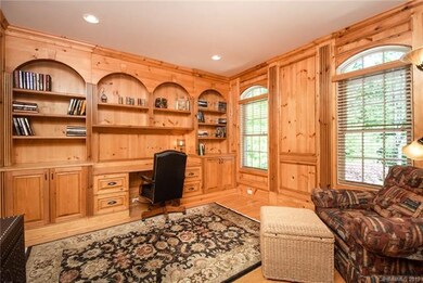 Executive office with built-in cabinetry