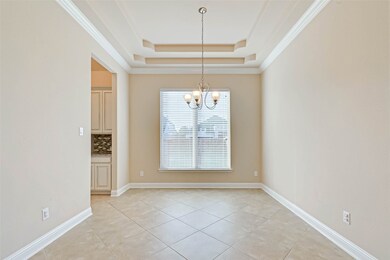 Formal dining with access to kitchen and butlers pantry