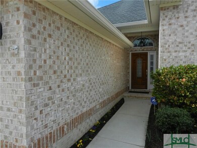 The front entry has a beautiful leaded glass solid