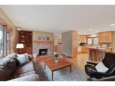 Spacious living room with classic Chicago brick fi