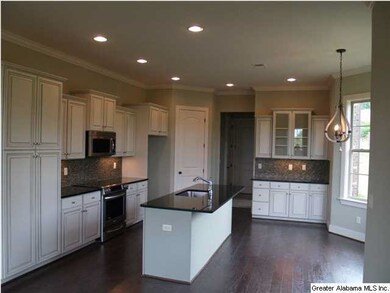 This open kitchen has room for the whole family!