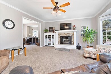 The living room leads into the formal dining room.