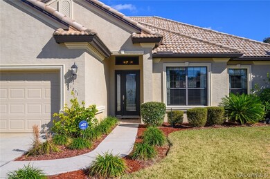 Notice the beautiful beveled glass entry door.  Gr