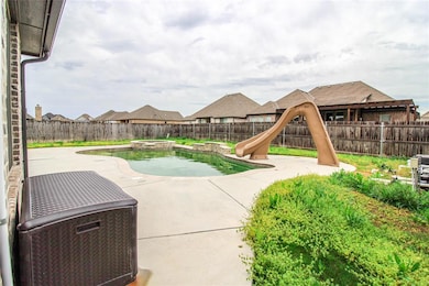 View of patio featuring a fenced backyard and a po