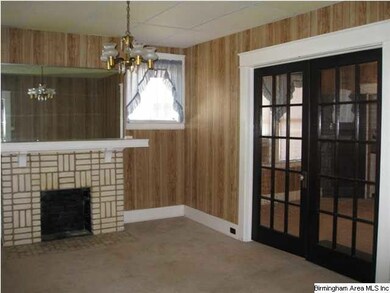 Livingroom with French Door going to Dining Room