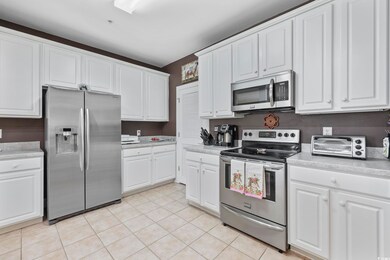 Kitchen featuring appliances with stainless steel 