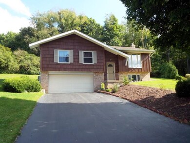 2 stall garage ~ easy to maintain landscaping ~ re