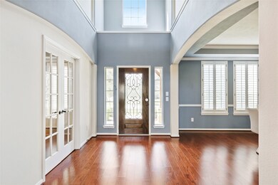 The office & formal dining rooms have plantation style shutters and the lighting has also been upgraded. Notice the high volume ceilings!