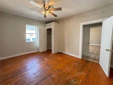 Bedroom 1, facing the bathroom and living room