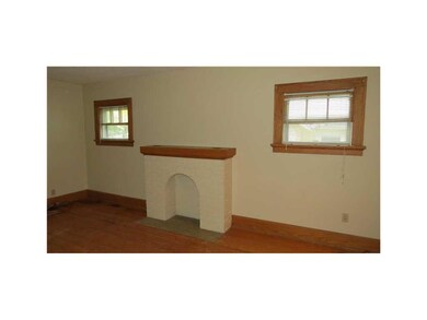 Living Room. Decorative fireplace located in the l