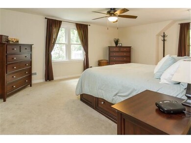 Spacious master suite is open and bright.