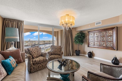 Living room featuring hardwood / wood-style floori