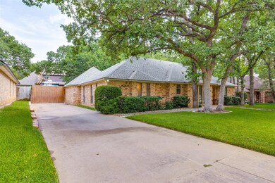 Ranch-style home featuring a front yard