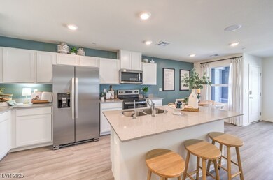 Kitchen with appliances with stainless steel finis