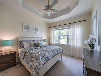 Mastr bedroom with entry way to lanai and stunning views