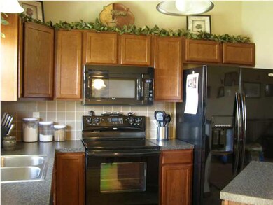 Notice the full backsplash and nice countertops