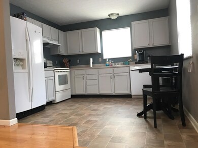 Freshly painted kitchen and new flooring