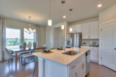 Photo is not of the actual home, but is an inspirational photo of builder’s model home and may depict options, furnishings, and/or decorator features that are not included