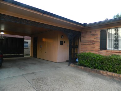 Property entrance featuring a carport