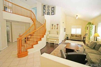 Soaring vaulted ceilings with views to the second 