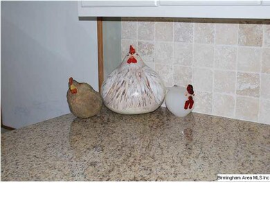 New Granite Countertops and tumbled marble backspl