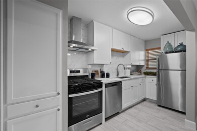 The kitchen has lots of cabinet space and a large