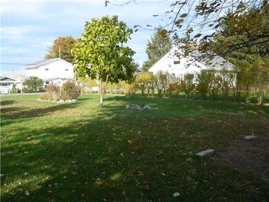 Exterior Front. There are houses on either side of