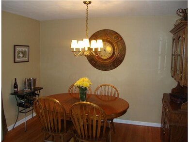 Dining Room The dining room has gleaming hardwood 