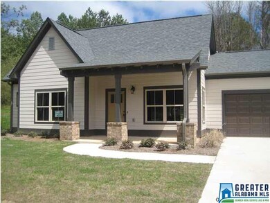 Hardiplank siding, dimensional roof, brick accents