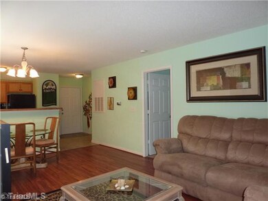 Living Room. Beautiful laminate flooring and open living space.