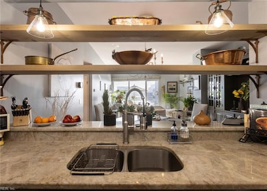 A view from the kitchen to the dining/living area