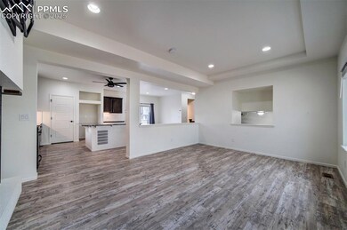 Unfurnished living room with wood finished floors, recessed lighting, and ceiling fan