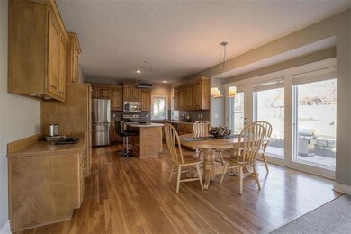 Gleaming hardwood floors, ALDER cabinetry, and lig