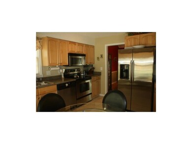 KITCHEN UPDATES INCLUDE NEW CABINETS, STAINLESS AP