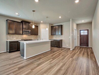 Photo is not of the actual home, but is an inspirational photo of builder’s model home and may depict options, furnishings, and/or decorator features that are not included