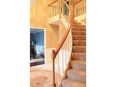 Entry/Foyer. Grand Entry with Sweeping Staircase &